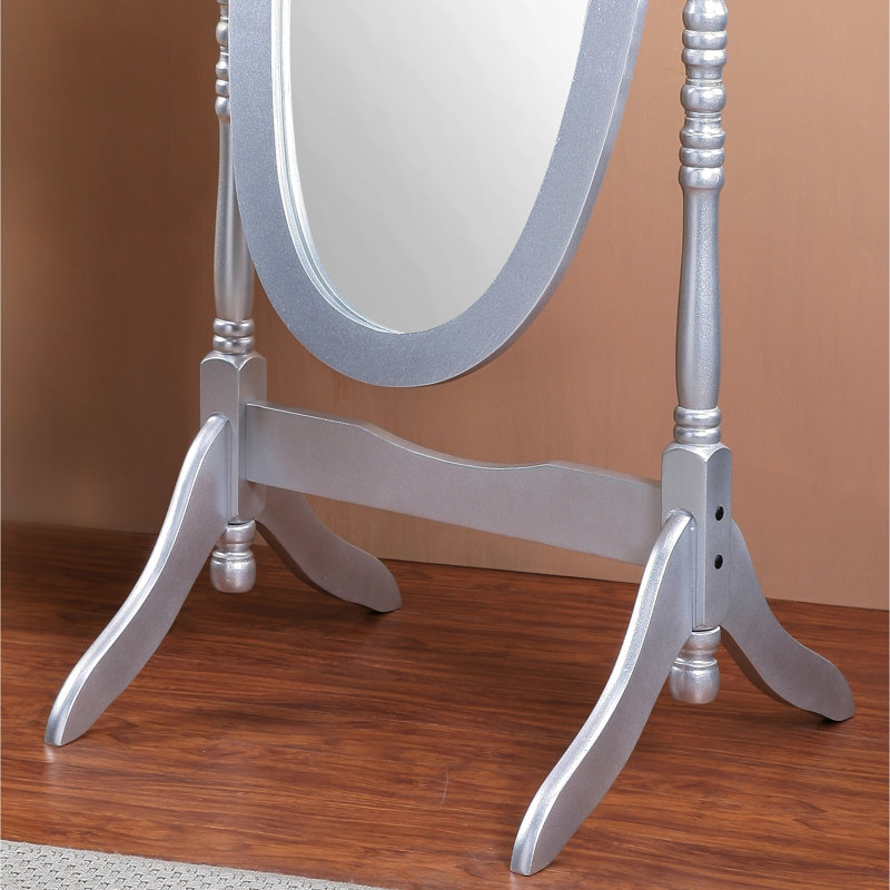 Miroir exotique de style traditionnel royal avec une finition argentée particulière.