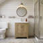Meuble-lavabo Livorno de 24 po avec comptoir en céramique au fini noyer clair Red Barrel Studio®