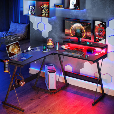 Abdulhameed L-Shaped Metal Base Computer Desk with Power Outlet