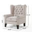 Fauteuil à oreilles capitonné Osvaldo-111312699