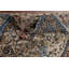 Tapis traditionnel ivoire en laine à motif floral 7 x 10