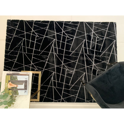 Broschard Faux Fur Rug Black With Silver Lines