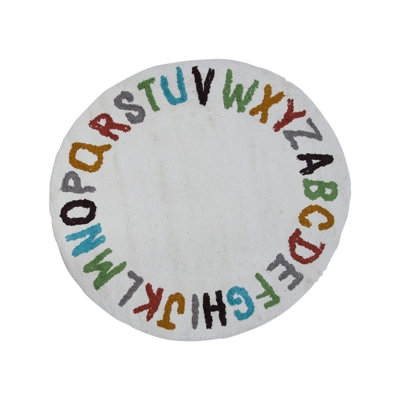 Tapis rond ivoire en coton touffeté Blissany