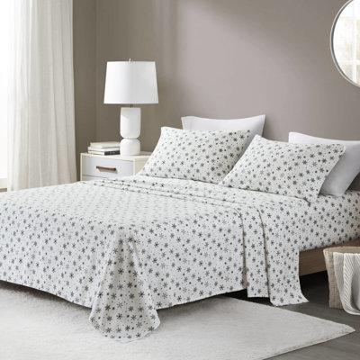 Drap pleine grandeur 4 pièces avec imprimé de flocons de neige noirs, 100% flanelle de coton pour matelas jusqu'à 18 po de profondeur, doux et confortable grâce à un brossage supérieur, ajustement ajusté, mieux ajusté, pré-rétréci, livré à plat