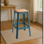 Tabouret de bar à structure en métal avec siège en bois pour la salle à manger