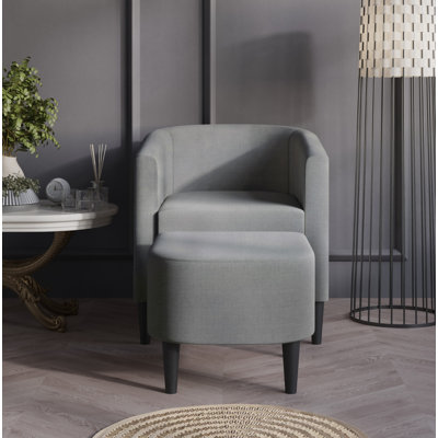 Ensemble de fauteuil et repose-pieds rembourrés