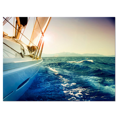 " Yacht Sailing In Wavy Waters "