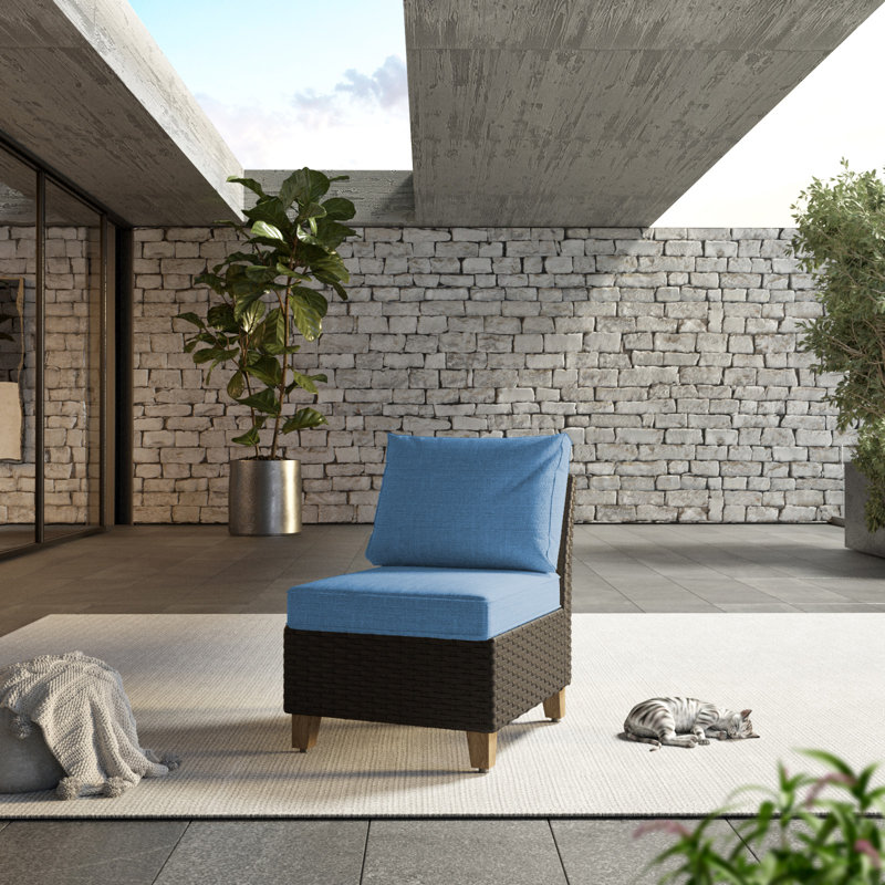 Chaise de patio en osier avec coussins amovibles Umeh, Bleu paon