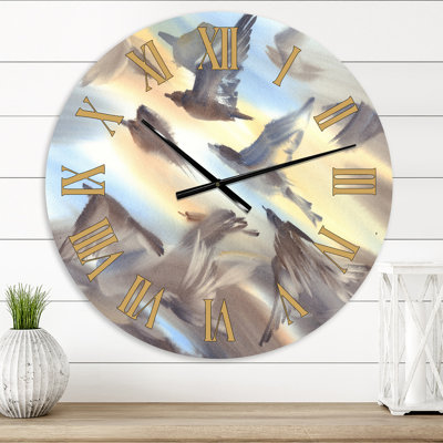 Volée d'oiseaux volant sur fond pastel