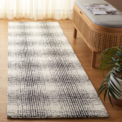 Tapis ivoire / noir Ebony 809