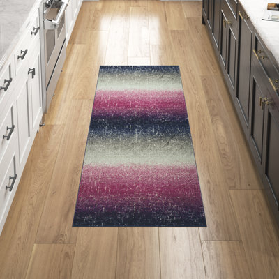 Tapis fuchsia / bleu marine Christa