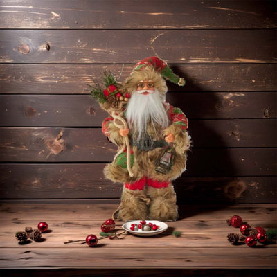 Père Noël rouge avec lanterne