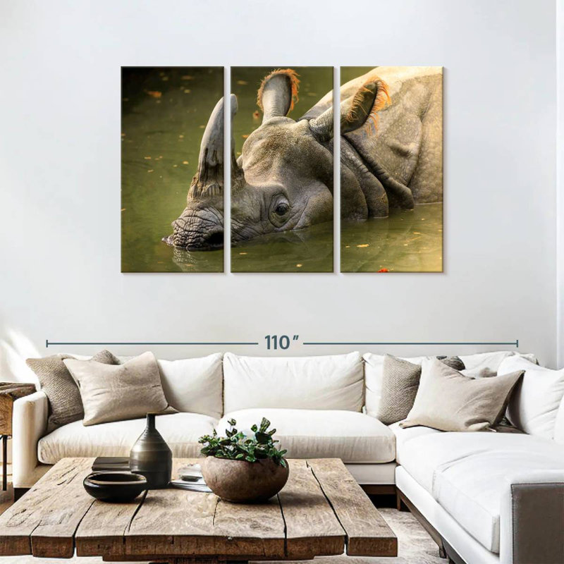Rhino In Muddy Water