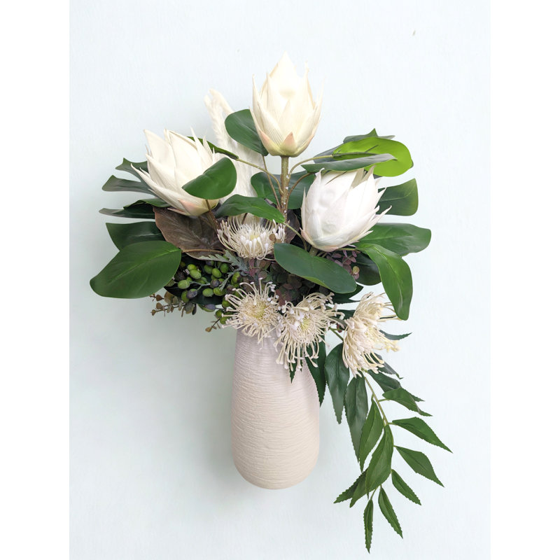 Arrangement floral varié Protea dans un vase