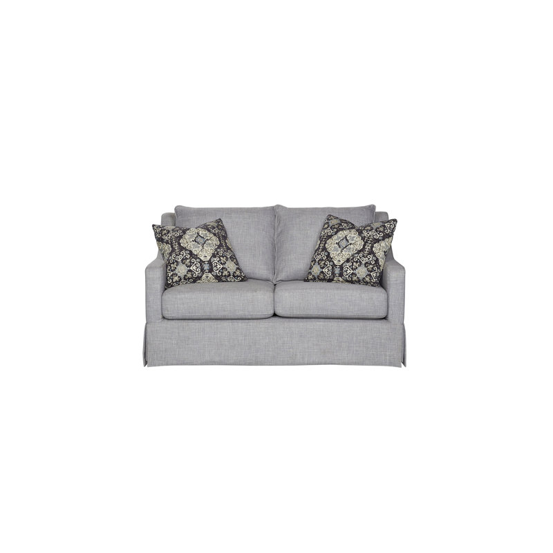Causeuse confortable avec jupe, coussins réversibles et deux coussins pour une expérience relaxante et élégante