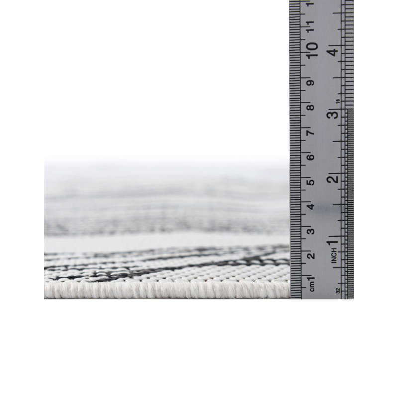 Tapis intérieur / extérieur gris anthracite / ivoire en polypropylène Firman Wygant, Rond 13 pi