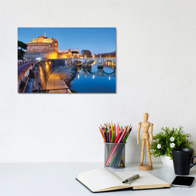 Castle Of The Holy Angel Lit Up At Dusk, Rome, Lazio, Italy by George Oze - Wrapped Canvas Print