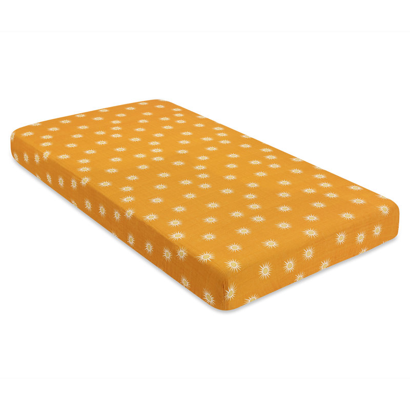 Golden Hour Organic Cotton Toddler Crib Sheet with Sunburst Pattern