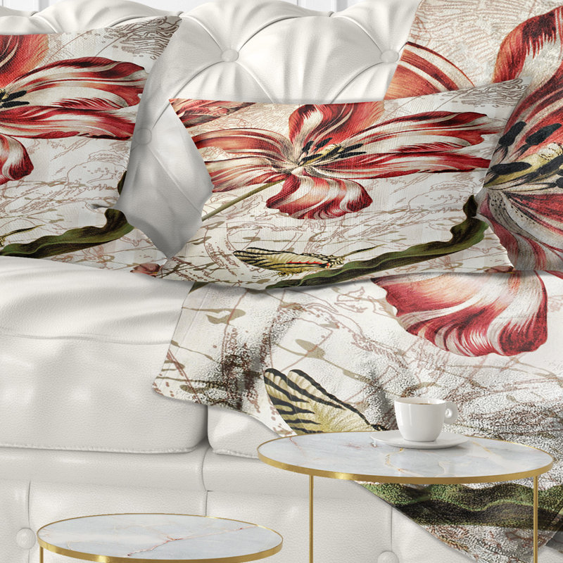 Coussin décoratif à motif floral rouge avec papillon