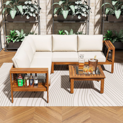 Ensemble de conversation en L 4 pièces pour 6 personnes avec table basse, coussins et canapé modulaire en bois d'acacia