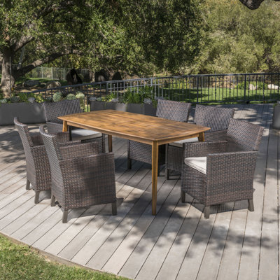 Pilger 6 - Person Acacia Wicker Patio Dining Set with Rectangular Table