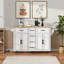 56.5" Kitchen Island With Drop Leaf & Power Outlet, Embossed Vertical Stripe Rolling Cart With 4 Doors, 5 Deep Drawers & Adjustable Shelves, White