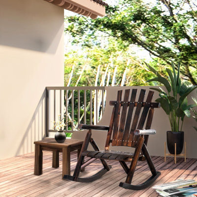 Chaise berçante en bois brun