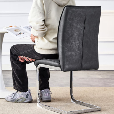 Siège gris foncé à la mode, unité centrale Crazy Horse, pieds arqués en métal, ajout de style à la chaise simple de luxe, rembourrage en éponge haute résilience, attrait moderne