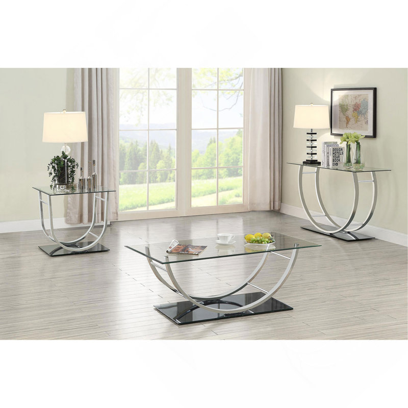 Table basse chromée à dessus en verre en forme de U