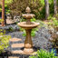 Fontaine solaire traditionnelle à 2 niveaux en résine et ananas Kirt-288871653