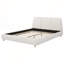 Structure de lit tapissier grand format avec tissu en lin moelleux et pieds en bois robustes