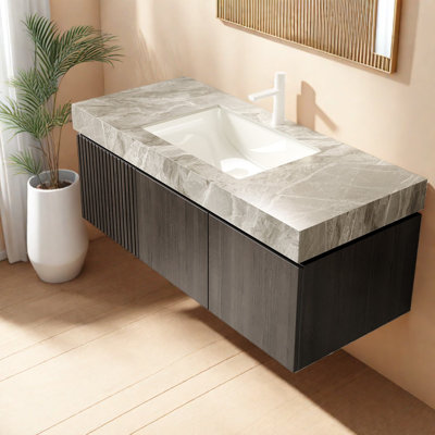 Meuble-lavabo moderne avec rangement, plateau en pierre gris clair, style époustouflant