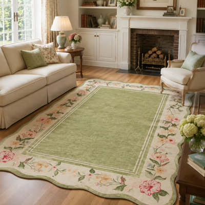 Tapis vert sauge à bordure festonnée