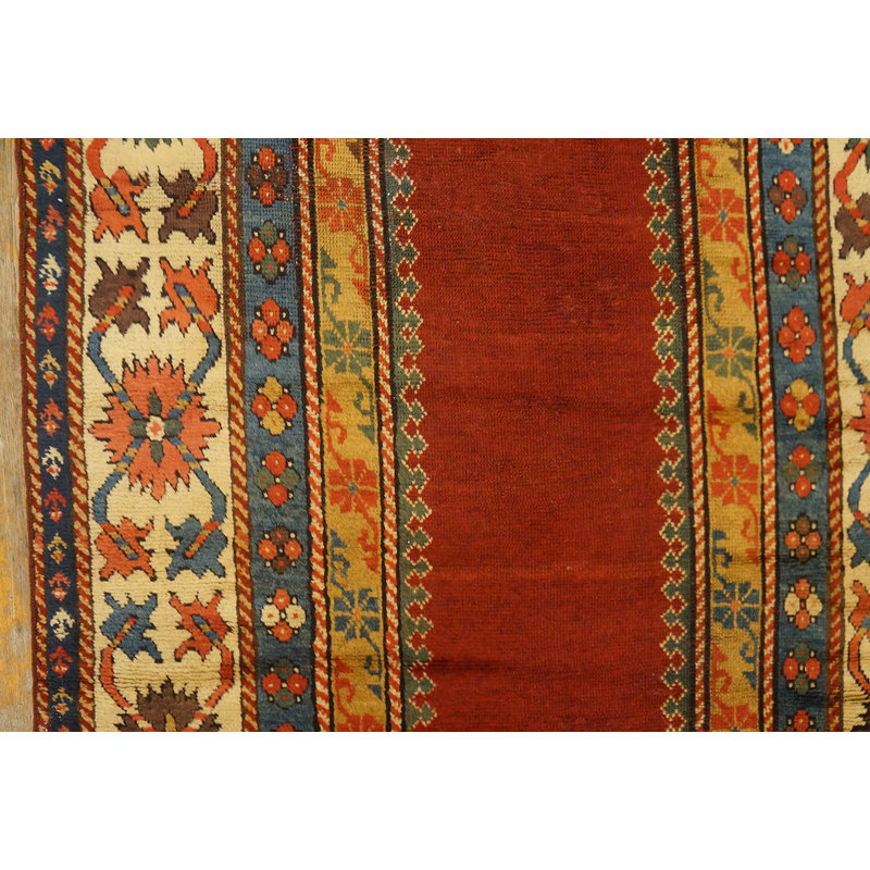 Tapis kazak à motif géométrique de couleur rouille