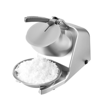 Machine à glace pilée électrique 2 lames, 65 kg/h, 300 W, 2000 tr/min, pour usage domestique et professionnel. Bol et couvercle inclus. Finition argentée.