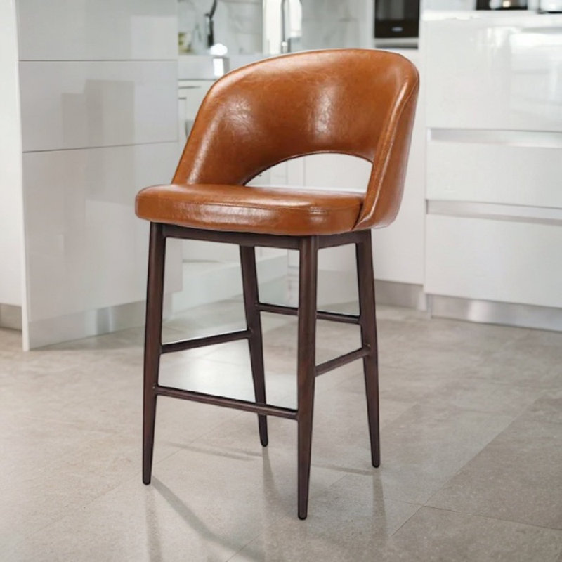 Tabouret Xaedyn classique en cuir de style Mid-Century moderne, bien que fabriqué, Tanné