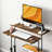 Adjustable Standing Desk With Tiltable Tabletop, Built-In Charging Station, And Lockable Wheels For Enhanced Productivity And Comfort