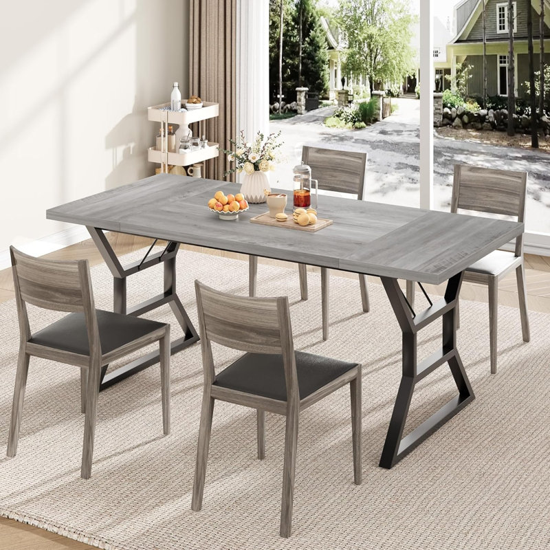 Table de salle à manger de style industriel avec structure en fer noir et plateau en panneau de fibres à densité moyenne