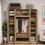 Armoire-penderie à grande capacité avec tringle, tablettes réglables et portes décoratives en rotin-218877690