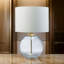 Lampe de table 21 pouces, abat-jour tambour blanc, base ronde en verre transparent, métal laiton