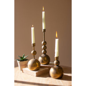 SET OF THREE ANTIQUE BRASS TAPER CANDLE HOLDERS