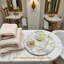 Assiette ronde blanche Statuario