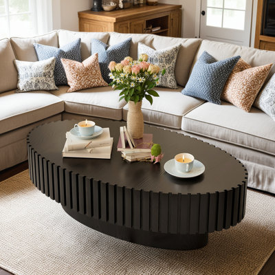 Table basse fabriquée à la main en forme d'olive avec base en panneau de fibres à densité moyenne durable