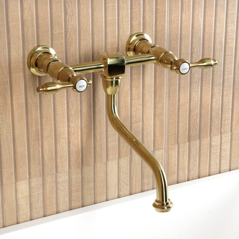 Kingston Brass Tudor Two-Handle 2-Hole Wall Mount Bathroom Faucet, Brushed Brass