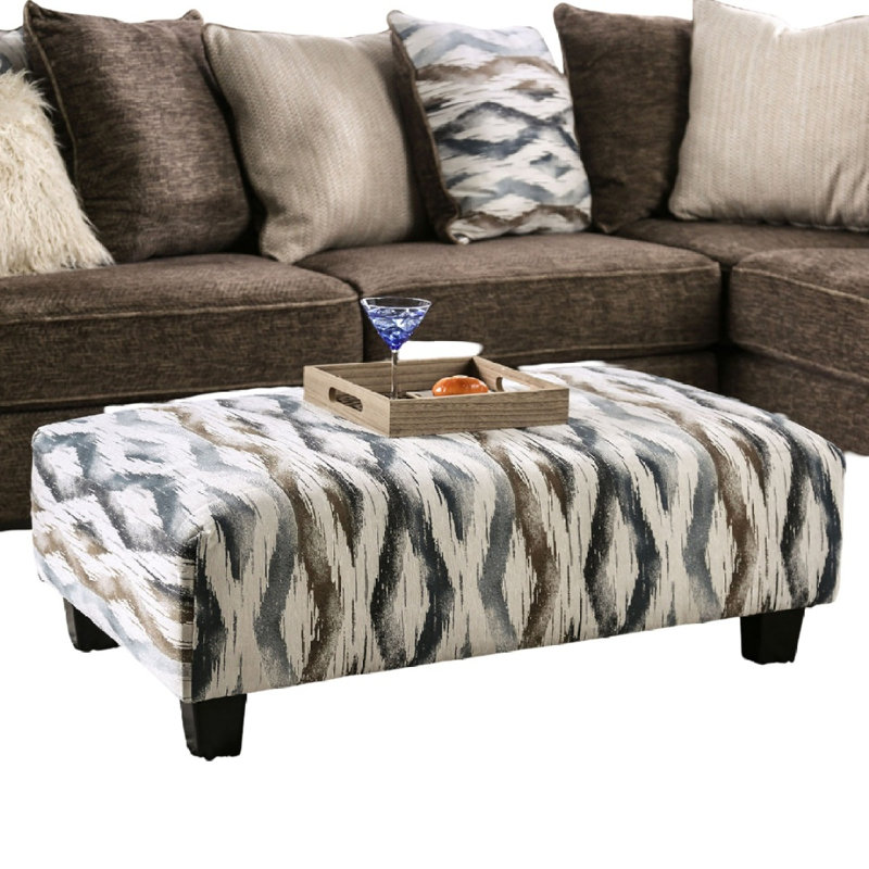 Repose-pieds rembourré de style contemporain avec pieds blocs fuselés en microfibre doux au fini contemporain