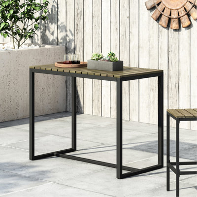 Table de bar gracieuse en bois avec structure en métal noir pour le patio