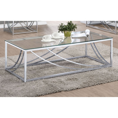 Et table basse rectangulaire en verre avec pieds en métal pour le salon - hauteur de 17 po, largeur de 48,35 po, profondeur de 23,5 po, look contemporain, supports faciles à entretenir.