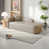 Orienté à gauche (vu de face)