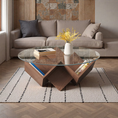 La table basse ronde avec plateau en verre et tablettes de rangement à motif géométrique abstrait Art Deco
