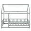 Lit simple en bois avec structure de toit et garde-corps-124151183